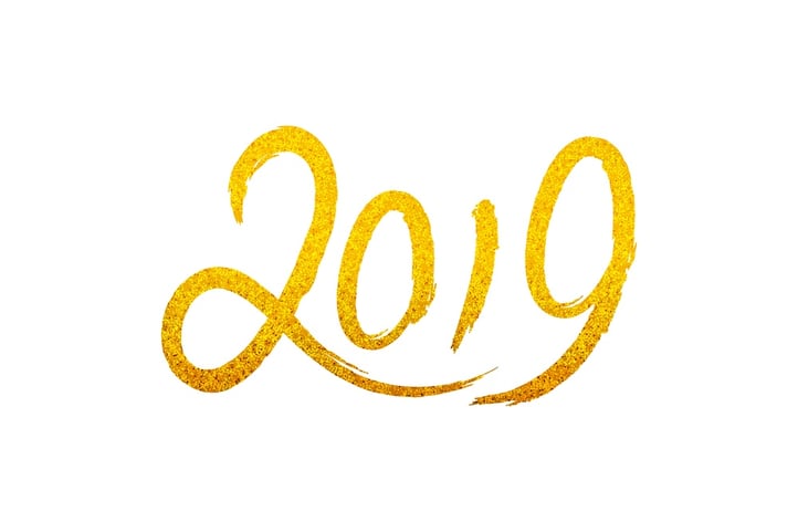 2019 in flowing script, glittery gold color.
